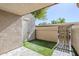 Enclosed patio with artificial turf and a convenient outdoor storage area at 818 S Westwood -- # 101, Mesa, AZ 85210