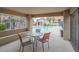 Covered poolside patio provides shade and seating with views of the inviting pool, creating a relaxing retreat at 818 S Westwood -- # 101, Mesa, AZ 85210
