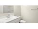 Well-lit bathroom featuring a sleek vanity, modern fixtures, and a shower-tub combination at 91 S Collier Ln, Casa Grande, AZ 85122