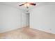 Bedroom with neutral carpet and ceiling fan at 962 W Keating Ave, Mesa, AZ 85210