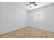 Bedroom with neutral carpet and blinds at 962 W Keating Ave, Mesa, AZ 85210