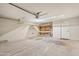 Spacious garage with overhead shelving at 962 W Keating Ave, Mesa, AZ 85210