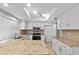 Updated kitchen with granite countertops, ample cabinet space, and modern appliances at 962 W Keating Ave, Mesa, AZ 85210