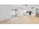 Open floor plan with a combined living and dining area next to a kitchen at 962 W Keating Ave, Mesa, AZ 85210
