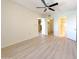 Bedroom with wood floors and access to the bathroom at 10330 W Thunderbird Blvd # B313, Sun City, AZ 85351