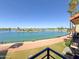 Scenic view of lake with palm trees and buildings from black railing balcony at 10330 W Thunderbird Blvd # B313, Sun City, AZ 85351