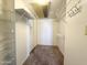 Spacious walk-in closet with shelving and hanging rods provides ample storage at 10330 W Thunderbird Blvd # B313, Sun City, AZ 85351