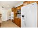 Bright kitchen featuring modern stainless steel appliances and ample wood cabinet space at 10619 W Loma Blanca Dr, Sun City, AZ 85351
