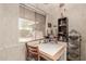 Cozy breakfast nook with bright natural light and quaint design at 10860 W Buccaneer Dr, Sun City, AZ 85351
