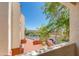 View from the balcony showcasing a road, trees, and a mountain in the distance at 12123 W Bell Rd # 219, Surprise, AZ 85378