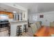 Stylish kitchen with stainless steel appliances, breakfast bar and ample counter space opens to the living space at 12123 W Bell Rd # 219, Surprise, AZ 85378