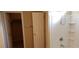 Shower area featuring white tiles and a shower head at 14977 W Charter Oak Rd, Surprise, AZ 85379