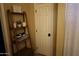 Bathroom showing shelf, linens, decor, and shower curtain at 14977 W Charter Oak Rd, Surprise, AZ 85379