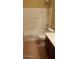 Bathroom featuring a shower and tub combo at 14977 W Charter Oak Rd, Surprise, AZ 85379