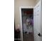 Open closet showcasing organized clothing, shoes, and storage solutions at 14977 W Charter Oak Rd, Surprise, AZ 85379