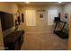 Versatile living space featuring natural light and modern amenities, suitable for various activities at 14977 W Charter Oak Rd, Surprise, AZ 85379