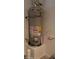 A close up of a newer AO Smith water heater installed on a short platform at 14977 W Charter Oak Rd, Surprise, AZ 85379