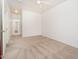 Large bedroom featuring plush carpet and a view of the ensuite closet at 15518 W Ocotillo Ln, Surprise, AZ 85374