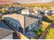 Home with a desert landscape including patio seating, lounge furniture, and privacy fence at 16551 W Winston Dr, Goodyear, AZ 85338