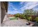 Private backyard featuring desert landscaping, a patio, and mountain views in the distance at 16551 W Winston Dr, Goodyear, AZ 85338