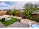 Enjoy outdoor living in this backyard with a patio, low-maintenance landscape, and mountain views at 16551 W Winston Dr, Goodyear, AZ 85338