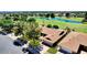 Stunning aerial view of a home near a golf course and water feature, showcasing its prime location and community at 18626 N 130Th Ave, Sun City West, AZ 85375