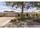 Charming single-story home featuring a well-manicured lawn, desert landscaping, and a spacious two-car garage at 18626 N 130Th Ave, Sun City West, AZ 85375