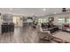 Open concept living room that seamlessly blends the living room and the kitchen, making a big space for entertaining at 18626 N 130Th Ave, Sun City West, AZ 85375