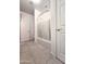 Clean bathroom with tiled floors, a shower-tub combo, and neutral color palette at 19954 W Moonlight Path, Buckeye, AZ 85326