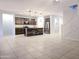 A kitchen featuring a large island, stainless appliances, and a modern design at 19954 W Moonlight Path, Buckeye, AZ 85326