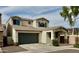 Charming two-story home with a spacious garage and landscaped front yard at 22507 N 31St Ave # 11, Phoenix, AZ 85027
