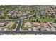 Neighborhood aerial view featuring lush trees, wide streets, and well-maintained homes at 2466 E Aris Dr, Gilbert, AZ 85298