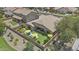 Aerial view of home with manicured backyard featuring lounge area, patio, and lush landscaping at 2466 E Aris Dr, Gilbert, AZ 85298