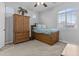 Bright bedroom with carpet, and a daybed with drawers plus traditional furnishings and natural light at 2466 E Aris Dr, Gilbert, AZ 85298