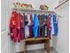 closet with clothing and toys in a well organized space, including a shelf and a clothing rack at 2466 E Aris Dr, Gilbert, AZ 85298