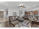 Expansive living space with hardwood and tile floors, connecting to the kitchen area at 2466 E Aris Dr, Gilbert, AZ 85298