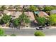 Showcasing a vibrant community from an aerial perspective, with picturesque streets and carefully manicured green spaces at 2551 W Sawtooth Way, San Tan Valley, AZ 85144