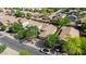 This aerial view captures the home's positioning within a community known for its mature landscaping and curb appeal at 2551 W Sawtooth Way, San Tan Valley, AZ 85144