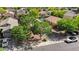Aerial photo showcasing the house nestled in a neighborhood known for well-kept lawns and serene backyard pools at 2551 W Sawtooth Way, San Tan Valley, AZ 85144