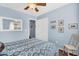 A comfortable bedroom with wood floors and closet space at 2551 W Sawtooth Way, San Tan Valley, AZ 85144