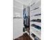Spacious walk-in closet features custom shelving and ample storage at 2551 W Sawtooth Way, San Tan Valley, AZ 85144