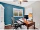 Functional office featuring a desk, office chair, and window at 2551 W Sawtooth Way, San Tan Valley, AZ 85144
