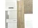 Interior design sample board with white cabinets, quartz countertop, wood flooring, and carpet swatch at 25817 N 147Th Dr, Surprise, AZ 85387