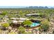A desert home community as seen from above, showcasing the landscape, mountain views, and surrounding natural beauty at 30600 N Pima N Rd # 81, Scottsdale, AZ 85266