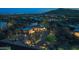 Breathtaking aerial view of a luxurious home nestled in a desert community, surrounded by lush landscaping and scenic views at 30600 N Pima N Rd # 81, Scottsdale, AZ 85266