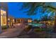 Spacious backyard oasis with a pool, spa, desert landscaping, and a brick walkway leading to the inviting outdoor space at 30600 N Pima N Rd # 81, Scottsdale, AZ 85266