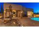 Outdoor living at its finest, with a pool view from the exterior featuring a fountain and desert landscaping for a serene atmosphere at 30600 N Pima N Rd # 81, Scottsdale, AZ 85266