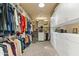Spacious walk-in closet with custom shelving and ample storage space at 30600 N Pima N Rd # 81, Scottsdale, AZ 85266