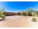 Stunning desert home with a three-car garage, mature landscaping, and a charming paver driveway at 30600 N Pima N Rd # 81, Scottsdale, AZ 85266