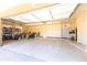 Spacious garage with ample storage, workbench and epoxy flooring at 30600 N Pima N Rd # 81, Scottsdale, AZ 85266